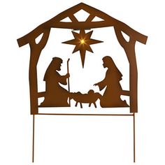 a metal nativity scene with the birth of jesus and baby jesus in manger