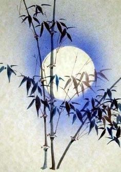 an artistic photo of bamboo branches with the moon in the background