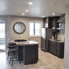 the kitchen is clean and ready to be used as a dining room or office space