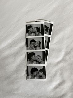 four pictures of people kissing each other on a white sheet