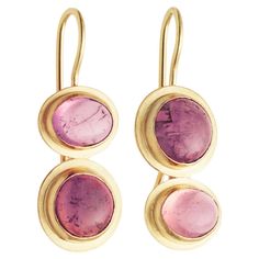 These 18k gold earrings with tourmalines in pale pink and deep magenta color are feminine, dainty, and very comfortable to wear. The perfect choice of jewelry to wear all day. The stunning and sumptuous pink tourmalines add a touch of color without taking centre stage and is particularly flattering to a wide range of skin tones. One of a kind and handmade. Rose Pale, 18k Gold Earrings, Tourmaline Earrings, Color Rosa, Pale Pink, Pink Tourmaline, Skin Tones, Tourmaline, Gold Earrings