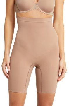 This sculpting shaper is lightweight and powerful with booty-lifting zones, a seamless design and high waist for supportive coverage. Support level: Shape-a firm hug Lined double gusset 55% nylon, 45% elastane Machine wash, dry flat Imported High Stretch Beige Shapewear With Built-in Shorts, Seamless Shapewear Bottoms Mid-thigh Length, Seamless Mid-thigh Length Shapewear Bottoms, Beige High-cut Leg Shapewear With Built-in Shorts, Mid Thigh Shorts, High Waist, Nordstrom, Cafe, High Waisted