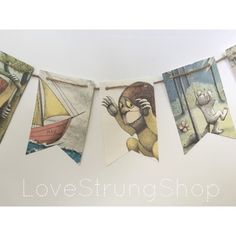 there are pictures hanging on the clothes line with words love strung shop written below them