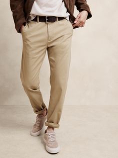 Inspired by a vintage pair of officer's chinos, this slim-fit pant is cut from an organic cotton twill with added stretch for comfort.  Here, we opted for an extra stone wash for a broken-in look and an already-loved feel.  Authentic Slim fit: Mid-rise.  Straight through hip and thigh.  Slim leg.  14" leg opening.  Zip fly with button closure.  Front and back pockets.  Unlined.  Authentic Slim fit: Mid-rise.  Straight through hip and thigh.  Slim leg.  Leg opening: 14" Inseams: Regular 32" Model Tom Outfit, Stretch Chinos, Khaki Chinos, Slim Fit Pants, Slim Leg, Slim Legs, Chinos Pants, First Look, Cotton Twill