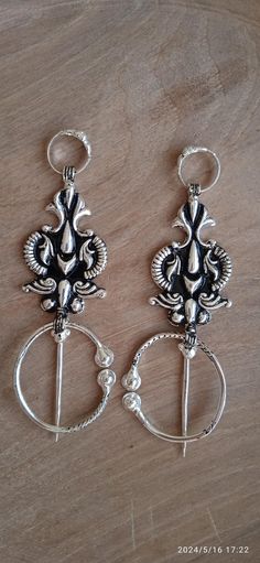 Discover the beauty of traditional Berber craftsmanship with this exquisite pair of silver Moroccan fibulas. These unique tribal pieces, intricately designed and symbolic of protection, are both functional and decorative. Handcrafted by Berber artisans, this fibula pair reflects the rich cultural heritage of North Africa and adds a bold, authentic touch to any jewelry collection. Wedding Gift Baskets, Cultural Heritage, North Africa, Morocco, Halloween Shopping, Favorite Jewelry, Brooches, The Beauty, Jewelry Collection