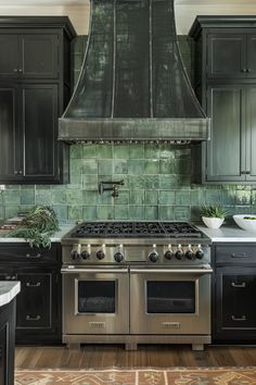 a stove top oven sitting inside of a kitchen next to black cabinets and counter tops