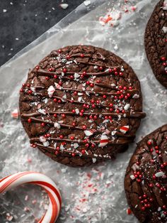 chocolate cookies with candy canes and sprinkles