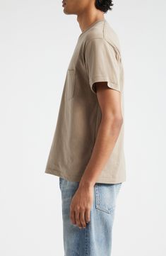 Relaxed and faded like a go-to favorite, this soft cotton T-shirt makes a great choice for everyday whether you're going out or staying in. 26 1/2" length (size Medium) Crewneck Short sleeves Chest patch pocket 100% cotton Machine wash, dry flat Imported Designer Clothing Pre-washed Relaxed Fit T-shirt For Streetwear, Casual Pre-washed T-shirt For Streetwear, Relaxed Fit Washed T-shirt, Basic Soft-washed Faded Top, Washed Short Sleeve T-shirt For Everyday, Relaxed Fit Faded Cotton Top, Basic Relaxed Fit Faded Top, Everyday Cotton Pre-washed T-shirt, Basic Faded Relaxed Fit Tops