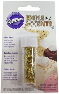 a package of edible accents with gold stars and glitters on the inside of it