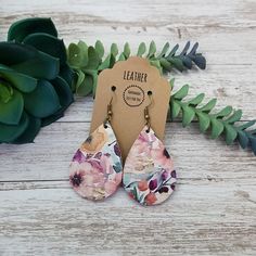 "These small cork and leather teardrop petal earrings make a great statement, yet simple and easy for everyday wear.  They are made with cork on the front and leather on the back, which gives them a firm feel and structure.  They feature flowers in colors of purple, yellow, pink, blue and green. They are lightweight and sure to pair perfectly with any outfit!  They also make great gifts for moms, daughters, grandmothers, sisters, friends, teachers, coworkers, and more! *Size = Small = 2\" long x 1.25\" wide with a drop length of 2.5\" *Thickness = 1.2mm = thick* *pattern will vary slightly from what is in the photo* *last photo shows other styles and sizes listed elsewhere in the store - these are the Small Teardrop* > Durable > Noise free > Affordable > Nickel free fishhook ear wire > Rub Spring Adjustable Teardrop Earrings, Spring Teardrop Earrings, Spring Teardrop Earrings As A Gift, Spring Gift Teardrop Dangle Earrings, Petal Earrings, Gifts For Moms, Rose Bleu, Earrings Colorful, Great Gifts For Mom