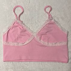 All Orders Ship Next 1-2 Business Days! Conditions: Like New, Clean And Good Condition, No Holes, No Stains, No Fade The Color Is Pink With White Lace Never Worn Before Great For Causal And Comfy Wear. Comes With Matching All Pink Shorts* Smoke Free And Pet Free Home! Casual Pink Tank Top With Lace Trim, Pink Cotton Y2k Crop Top, Y2k Pink V-neck Top, Pink Fitted Y2k Crop Top, Y2k Pink Camisole Top, Pink Y2k Camisole Top, Comfy Wear, All Pink, Going Out Tops