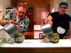 two men in the kitchen pouring green tea into jars