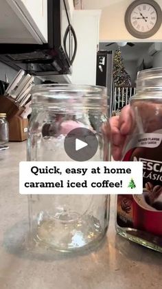 a person is pouring coffee into a jar