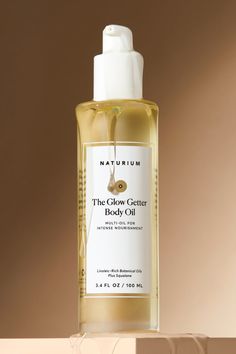 ✨ NATURIUM The Glow Getter Body Oil: Luxurious hydration that deeply moisturizes and reinforces your skin's natural lipid layer. Formulated with a botanical blend of antioxidant-rich oils like olive, jojoba, rosehip, and sea buckthorn, plus squalane, for glowing, replenished, and firmer-looking skin. #NATURIUM #BodyOil #GlowGetter #SkincareEssentials Clear Skin Care Routine, Hair Color Streaks, Body Mask, Antibacterial Soap, Surface Laptop, Sea Buckthorn, Body Care Routine