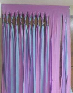 the curtains are purple and blue in color