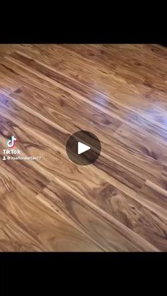 an image of a wood floor being cleaned with a video player on the sidelines