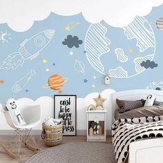 a child's bedroom with a space theme wallpaper