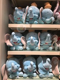 the shelves are filled with many different stuffed animals, including an elephant and piggie