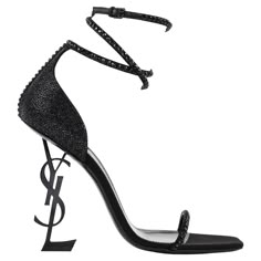 YVES SAINT LAURENT c.2017 "Opyum" Black Swarovski Crystal YSL Logo Sandals Heels Brand / Manufacturer: Saint Laurent Circa: 2017 "Opyum Sandal" Designer: Anthony Vaccarello Style: High Heels Color(s): Black Lined: No Marked Fabric: Satin Unmarked Fabric (feel of): Satin, Swarovski crystals Additional Details / Inclusions: Yves Saint Laurent circa 2017 "Opyum Sandal" high heels. Black satin fabric embellished with black Swarovski crystals. Large crystals cover the ankle and toe straps. Small crys Black Satin Fabric, Ysl Heels, Satin Noir, Yves Saint Laurent Shoes, Ysl Logo, Fancy Shoes, Embellished Sandals, Swag Shoes, Large Crystals