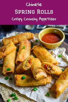 chinese spring rolls with dipping sauce on the side