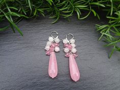 No outfit is complete without these beautiful pair of Rose & Pink Quartz drop earrings.  Quartz crystals are known as "master healing crystals," crystals that can be used to heal any condition that they are needed for. Because of their unique power to take on the energy of any situation (much like their color, white, contains all other colors), Quartz crystals are one of the single most beneficial stones that you can introduce into your life for healing purposes. EARRINGS *Hand made *Closure: Le Pink Stone Earrings Gift, Pink Stone Earrings For Gift, Healing Gemstones, Rose Quartz Earrings, Pillow Box, Earrings Pink, Pink Gemstones, Quartz Crystals, Earrings Drop