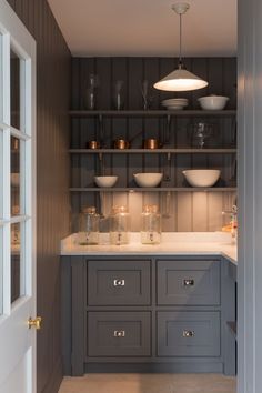 the instagram page for instagram com shows an image of a kitchen with grey cabinets and white counter tops