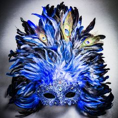 Blue Venetian Carnival Masquerade Top Feather Women Sexy Eye Mask Mardi Gras. Product Description: Condition: Brand New Made From Lace, Paper Mache, Resin, And Feather Fits Most Female Adults Comes With Silk Ribbon Ties On 2 Sides To Wear And Keep The Mask In Place On Your Face Size: 16" High X 16" Wide Color: Blue Mask With Blue Feather Usm-M8551-Blbl Blue Masks For Carnival Costume Party, Blue Masquerade Mask For Halloween Costume Party, Blue Masquerade Mask For Halloween Party, Blue Masquerade Mask For Mardi Gras Costume Party, Elegant Blue Masquerade Mask For Parties, Blue Masquerade Mask For Carnival Costume Party, Blue Masquerade Mask For Halloween, Blue Venetian Masquerade Mask For Party, Blue Eye Mask For Mardi Gras