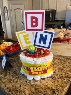 a birthday cake made to look like the letter b is for boy