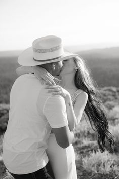 Black & white photo of a couple kissing in the mountains. A sweet mountain engagement photoshoot at Tahoe National Park. Discover engagement photos locations california, northern california engagement photos, forest engagement photos, unique engagement photos forest, & forest theme engagement photos. For the best mountain engagement photos & elegant wedding photos book Bry at brysphotography.com!