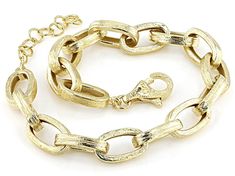 Step into elegance with the Artisan Collection of Turkey™'s Oval Link Bracelet! This stunning piece features a delicate design crafted from 18K Gold Over Sterling Silver. The playful oval links create a unique and eye-catching look that will elevate any outfit. Measuring at 7 inches in length x 0.29 inches in width, this bracelet is perfect for adding a touch of glamour to your everyday style or dressing up for special occasions. With its high-quality materials and exquisite finishing technique, Gold Oval Metal Chain Bracelet, Oval Gold Metal Chain Bracelet, Gold Oval Chain Bracelet, Gold Oval Chain Bracelets, Elegant Oval Gold Bracelet, Gold Oval Bracelet With Polished Finish, Elegant Oval Chain Bracelet With Polished Finish, Oval Gold Bracelet For Formal Occasions, Elegant Oval Metal Bracelets