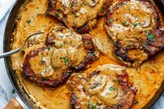 some meatballs and sauce in a pan on a table