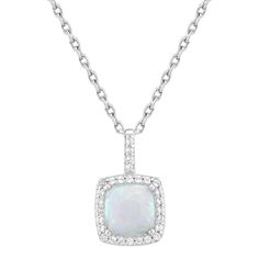 a white opal and diamond pendant on a chain