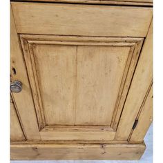 an old wooden cabinet with no drawers