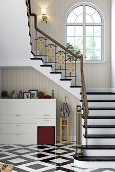 a stair case in front of a window next to a white and black checkered floor