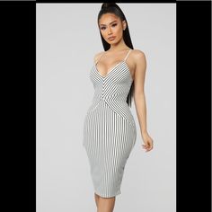 Ready For A Change Striped Midi Dress. White/Black Striped Midi Dress Adjustable Spaghetti Straps V Neck Back Zipper Closure Stretch Self: 95% Polyester 5% Spandex Lining: 100% Polyester Chic White Bodycon Dress With Spaghetti Straps, Chic White Spaghetti Strap Bodycon Dress, White Spaghetti Strap Bodycon Dress For Date Night, White Midi Dress With Spaghetti Straps For Night Out, Striped Spaghetti Strap Party Dress, White Bodycon Dress With Spaghetti Straps For Brunch, White Spaghetti Strap Bodycon Dress For Brunch, Midi Dress White, Striped Midi Dress