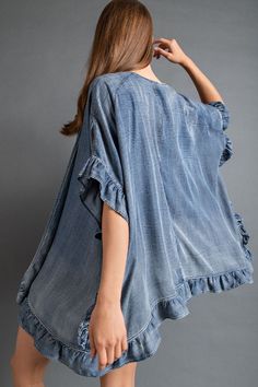 This Washed Denim Open Cardigan is the perfect piece to throw on over a swimsuit, bodysuit or cute tank with shorts. -Color: Denim -Boxy oversized fit -Lightweight tencel material -Ruffe detailing -Content: 100% Telcel -Hand wash/hang to dry -Imported -Length: 30" -Model is 5'5" 36-29-40 and wearing a size Small Denim Recycle, Embroidered Fashion, Apparel Design Inspiration, Upcycle Jeans, Washed Denim, Tunic Blouse, Open Cardigan, Apparel Design, Sewing Clothes