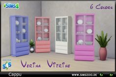 three different colored cupboards with plants in the middle one is pink, white and blue