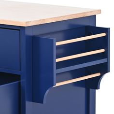 a blue cabinet with drawers and wooden handles