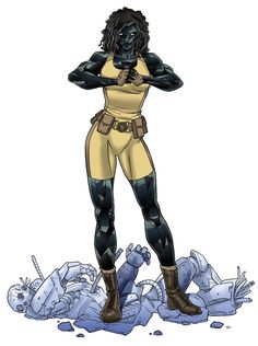 a woman in yellow and black costume standing on top of some rubble with her hands behind her head