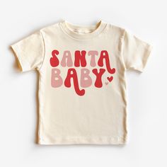 Santa Baby kids Christmas shirt, red santa Claus t shirt, baby claus tee, toddler infant christmas outfit,  Packaging:  The item will be folded and individually package into resealable clear poly bags. It will then be placed inside a box to be shipped to you. processing times: 5-7 days Material:  100 % cotton  Regular fit, midweight 180 gsm  preshrunk to minimise shrinkage Washing Instruction: Cold, gentle wash setting with like colours only Flip the shirt inside out before washing Do not tumble dry Do not use harsh detergents or bleach Do not dry clean Warm iron, inside out This shirt is made in Australia. Please check our shop for more T shirts. Please leave us a review to help our shop grow. Christmas Toddler Shirt, Kid Christmas Shirt, Toddler Christmas Shirts, Infant Christmas Outfit, Kids Christmas Shirts, Weihnachten Outfit, Baby Christmas Shirt, Kids Christmas Shirt, Toddler Christmas Shirt