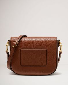 Small Darley Satchel | Oak Small Classic Grain | Women | Mulberry Travel Satchel Shoulder Bag With Horsebit Detail, Travel Shoulder Bag With Horsebit Detail Satchel, Classic Brown Shoulder Bag With Horsebit Detail, Workwear Crossbody Satchel With Brass Hardware, Classic Crossbody Saddle Bag With Detachable Strap, Crossbody Satchel With Brass Hardware For Work, Timeless Saddle Bag With Adjustable Strap, Cognac Workwear Bags With Brass Hardware, Chic Cognac Saddle Bag With Gold-tone Hardware