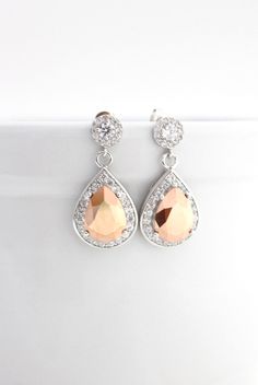 Gold Rose Swarovski Earrings Rose Gold Crystal Drop Earrings, Rose Gold Drop Bridal Earrings, Rose Gold Drop Bridal Earrings For Anniversary, Rose Gold Teardrop Chandelier Earrings Gift, Sparkling Rose Gold Drop Earrings, Rose Gold Drop Crystal Earrings For Party, Champagne Dangle Earrings For Wedding, Wedding Earrings Gold, Blush Earrings