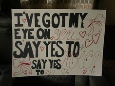 a sign that says i've got my eye on say yes to say yes