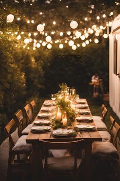 Backyard rehearsal dinner lit with string lights and lanterns, creating a romantic and festive atmosphere. Small Dinner Party Ideas Decor, Backyard String Lights Ideas, Casual Rehearsal Dinner Ideas, Romantic Dinner Set Up, Backyard Rehearsal Dinner, Intimate Wedding Dinner, Romantic Dinner Setting, Romantic Backyard Wedding, Backyard Lighting Ideas