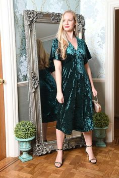 The luxurious feeling velvet in forest green is timeless and elegant and adds a something special to this occasion piece. The v neckline, kimono sleeves and midi length will have your turning heads in no time. Velvet Kimono, Dressing Gown Robe, Occasion Dresses Wedding, Beachwear Skirt, Kimono Sleeves, Green Midi Dress, Time Machine, Midi Dress With Sleeves, Kimono Sleeve