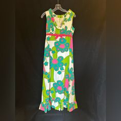 Summer Vibes! Vintage Baba Kea, Carol & Mary Honolulu Maxi Dress. There Is No Size Tag But I Believe It Is A Size Small As That Is What My Mom Wore. It Is A Fun Vibrant Print In Green, Aqua And Bright Pink On A White Background, It Has A Pink Velvet Bow At The Waist And A Scoop Neckline Trimmed In A Ruffle. Please Consider The Measurements Carefully When Purchasing. Measurements: Shoulder To Hem - 51.5” Umpire Waist To Hem - 40 3/4” Across The Chest - 16.5” Waist - 16” Hips - 20.5” Green Aqua, Clothing Vintage, Velvet Bow, Pink Velvet, Honolulu, My Mom, Scoop Neckline, Bright Pink, Size Tag