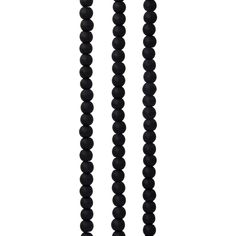 two black beads are attached to a necklace