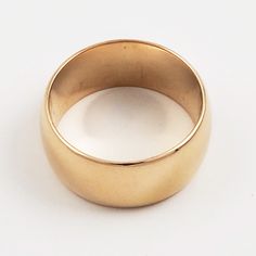 "This is a gorgeous 18K gold wedding band weighing 1/4 ozt! The vintage band is nice and wide, and has recently been re-polished to a shine so reflective, it's hard to photograph. This beautiful wedding ring was crafted decades ago, but you would hardly know it. Vintage: 1930s Size: 6 Materials: 18K Gold Marked: 18K Width: 5/16\" Stands Off Finger: 1/16\" Weight: 5.2 dwt / 7.8 g / .25 ozt Condition: Very Good FREE PRIORITY SHIPPING IN U.S.! Signature confirmation will be included. ASK ABOUT OUR Heirloom Yellow Gold Wide Band Ring, Gold Thick Decorative Band, Gold Wide Band Ring With Decorative Details, Gold Wide Band Ring With Decorative Design, Gold Decorative Thick Band Ring, Vintage Thick Band Wedding Jewelry, Vintage Yellow Gold Wide Band Ring For Anniversary, Heirloom Gold Thick Band, Heirloom Thick Gold Band