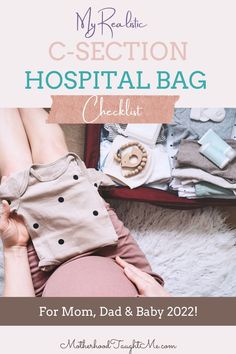 a woman is holding her baby's diaper in front of the hospital bag