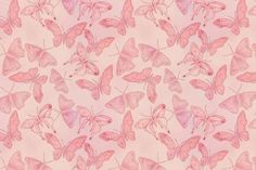 a pink background with lots of butterflies on it